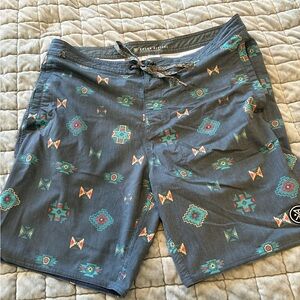 Roark swim trunks/hybrid shorts. Side pockets and back pocket. Great condition!